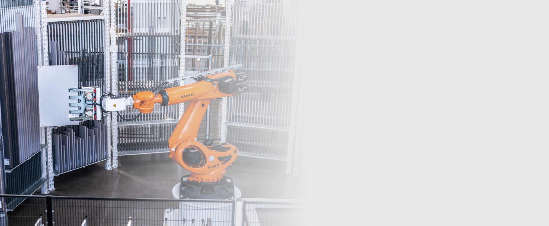 Orange industrial robot in the SUPERUS smart factory